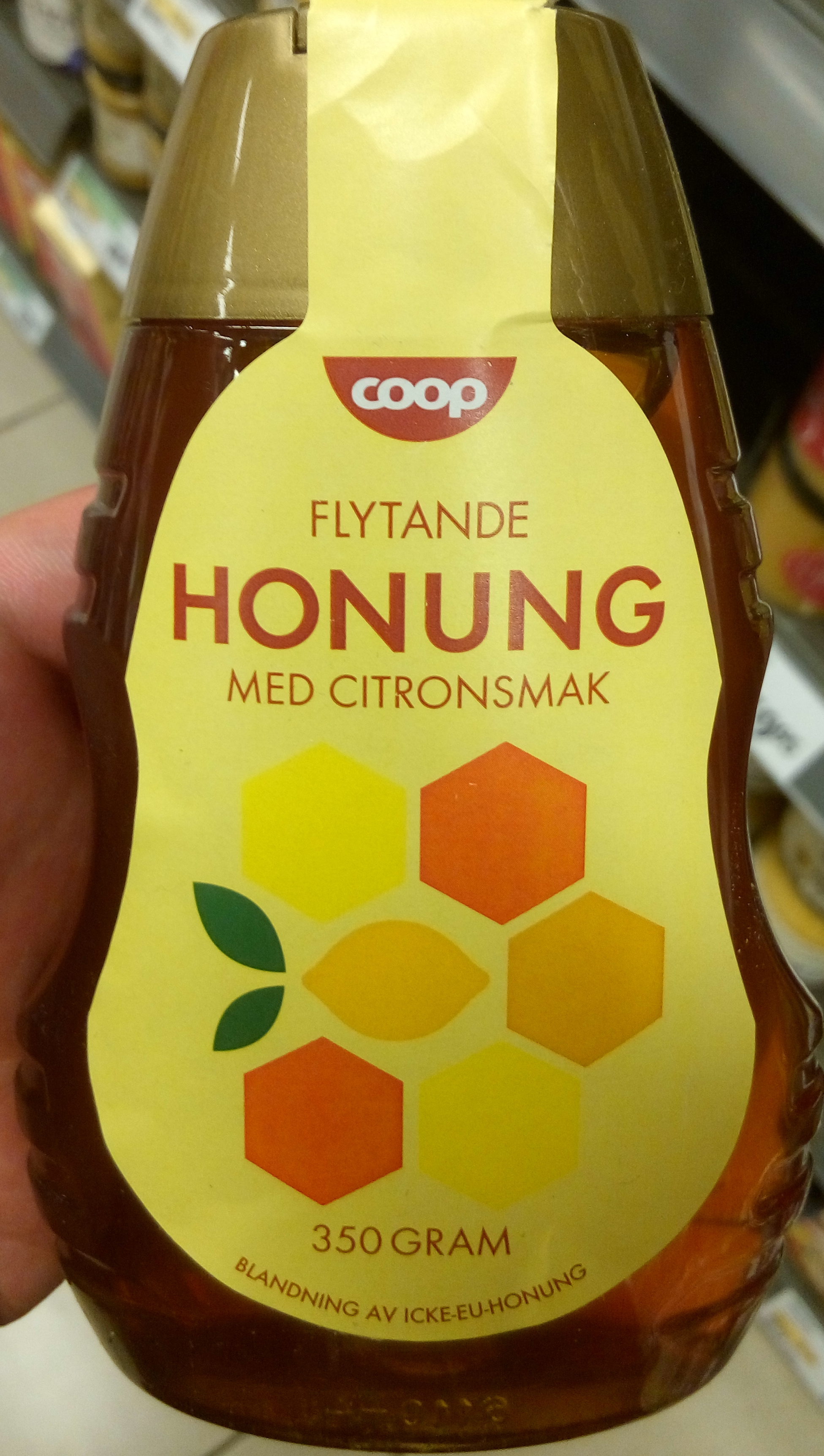 Flytande honung med citronsmak - Produkt - sv